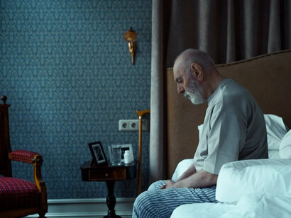 Elderly man struggles to get out of bed in the morning, battling to find meaning in life