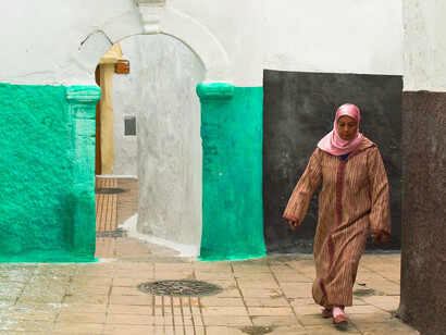 As she strolls through the historic streets, this woman embodies the spirit of the Moroccan people, contributing to the nation’s growth both at home and abroad