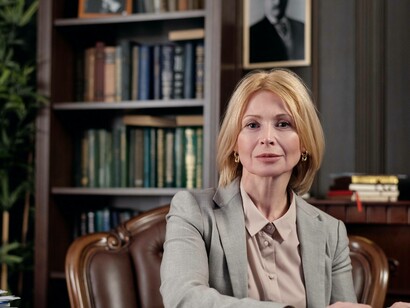 A politician in her office weighing up the many opinions of the public