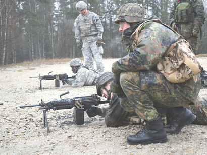 Bundeswehr Weapons Familiarization, Dec. 2015, U.S. soldiers from the Combined Arms Training Center, 7th Army Joint Multinational Training Command (JMTC), conducted familiarization training with German troops on U.S. weapons at the Grafenwoehr Training Area, Germany, on December 9, 2015