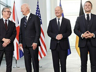 Prime Minister Keir Starmer attends a Quad meeting alongside German Chancellor Olaf Scholz, US President Joe Biden and French President Emmanuel Macron at the Bundeskanzleramt building in Berlin, Germany