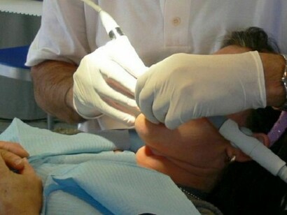 A dentist, working