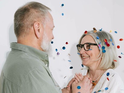 An aging couple celebrate their anniversary