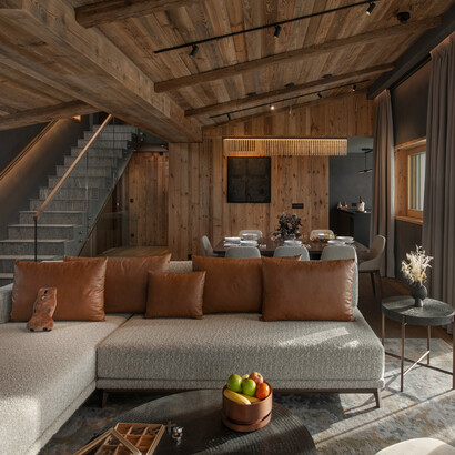A bedroom chalet at Six Senses Crans-Montana, providing a welcoming and homely atmosphere for guests