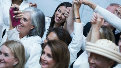 Democratic members of Congress wear white for U.S. President Donald Trump's address to a joint session