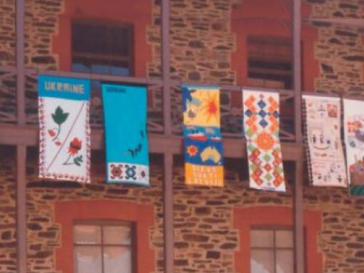 Aussies! The Migration Museum Banners Project, exhibition view. Courtesy of Migration Museum