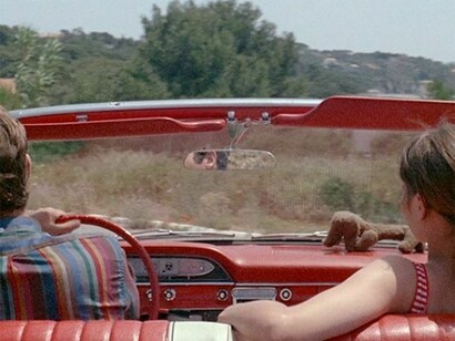 Jean-Paul Belmondo e Anna Karina in auto