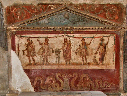 A fresco from the thermopolium of Lucius Vetutius Placidus in the city of Pompeii, depicting the spirit (genius) of the house central, flanked by Lares and Penates with Mercury on far left, Bacchus far right