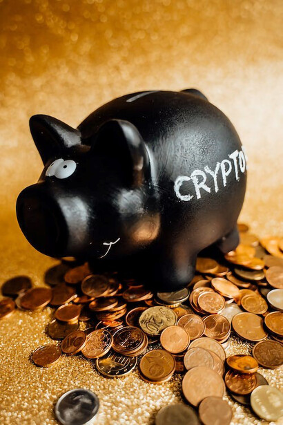 A piggy bank stands surrounded by a mound of coins, representing a whimsical yet valuable symbol of saving and financial growth in the cryptocurrency realm