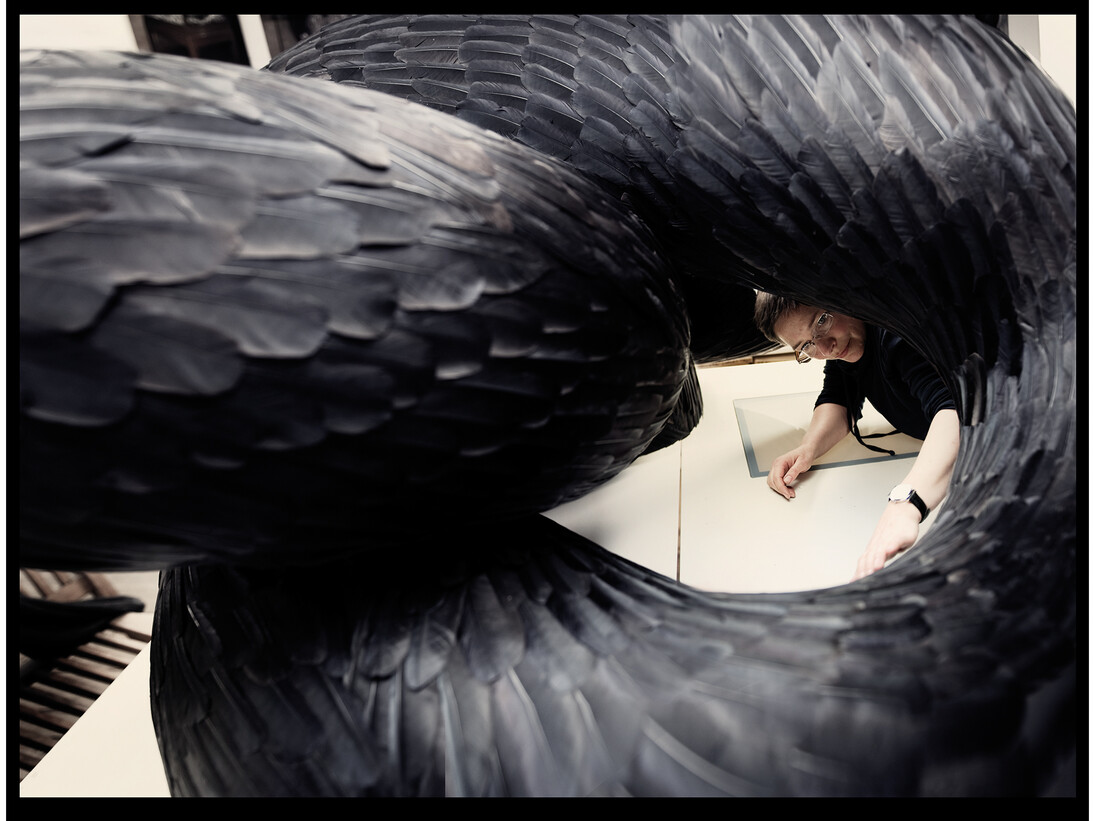 Kate MccGwire Studio shot with Gyre, mixed media with crow feathers, 2012, photograph by Tessa Angus © Kate McCGwire