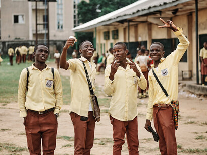 Capturing the essence of unity and progress, Nigerian students celebrate the mobile revolution, embracing the era of communication, innovation, and endless possibilities