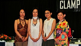 Da esquerda para a direita: Satsuki Igarashi, Nanase Ohkawa, Tsubaki Nekoi e Mokona em Exposição de animes, 2006.  Inicialmente o grupo era composto por 11 pessoas e era voltado para a criação de Dojinshis (obras auto publicadas de fãs de alguma obra), contudo o grupo passou a criar obras próprias, estreando em 1989 com RG Veda, após isso o grupo se reduziu para sete pessoas e em 1993 mais três membros saíram, deixando apenas as quatro membros restantes do grupo