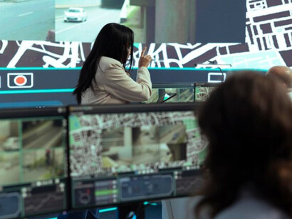 Overseeing and monitoring activity in a control center using digital surveillance systems and citywide camera networks