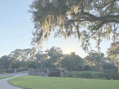 The sun setting in Palmetto Bluff on a tranquil day. Photo by Jamie Edwards