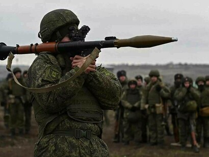 A grenade launcher operator of the Russian armed forces participates in combat drills at the Kadamovsky range in the Rostov region, Russia
