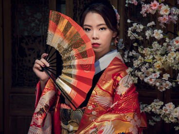 A woman dressed in a bright kimono, reflecting how centuries-old clothing traditions can inform the future of zero waste fashion