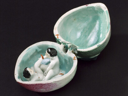 Porcelain fruit, hinged, contains male and female copulating, Courtesy of Science Museum / Science and Society Picture Library