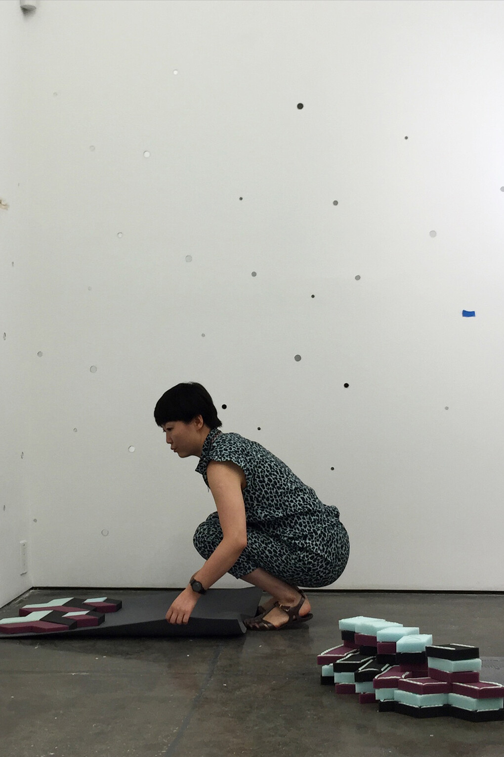 Ying Zhu installating site-specific work at Klein Sun Gallery