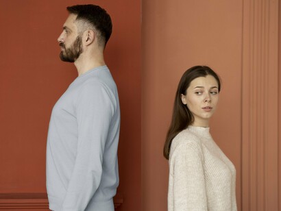 Two partners maintaining emotional distance, reflecting the difficulty of letting go without losing compassion