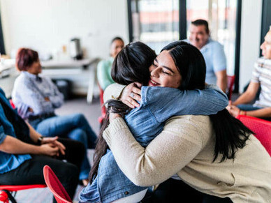 Individuals engaged in meaningful dialogue, embracing mutual respect and understanding in the pursuit of societal harmony