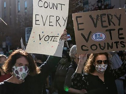Philadelphians of all ages and all colors, not practicing social distancing but wearing masks