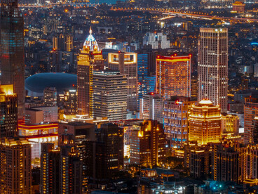 A city glowing with innovation and connectivity, symbolizing the opportunities created by the digital revolution for modern societies