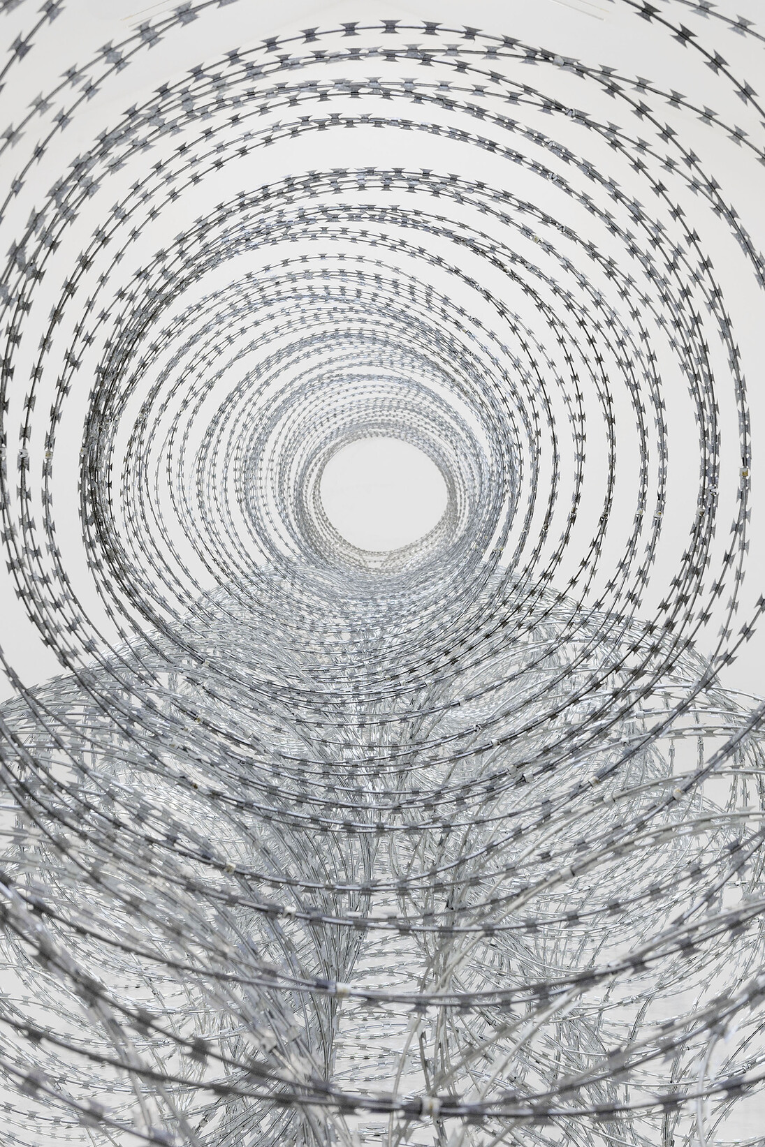 View of the exhibition Gianni Motti “Draft” Galerie Perrotin Paris from October 22 to December 19, 2015. “Draft”, 2015, razor barbed wire, Photo: Claire Dorn, Courtesy Galerie Perrotin