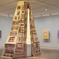 Mounira Al Solh, Sperveri, 2017 (front), embroidery and mixed media on linen and cotton, various dimensions and My speciality was to make a peasants’ haircut, but they obliged me work till midnight often, 2014–2017 (back), textile collages with hand- and machine stitched embroidery and mixed media, various dimensions. Installation photograph of Mounira Al Solh: I strongly believe in our right to be frivolous, February 8 - April 29, 2018, Art Institute of Chicago. Image courtesy of the Art Institute of Chicago.