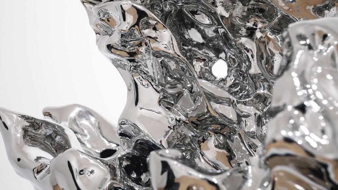 Zhan Wang, Artificial Rock #112, 2006, Stainless steel and wood, 30.5 x 18 x 10 inches. Courtesy of the artist and Haines Gallery 
