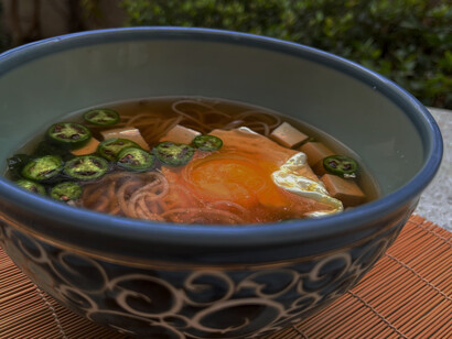 Hot poached egg oyster sauce noodles