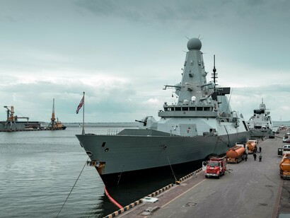 A ship docked by the port