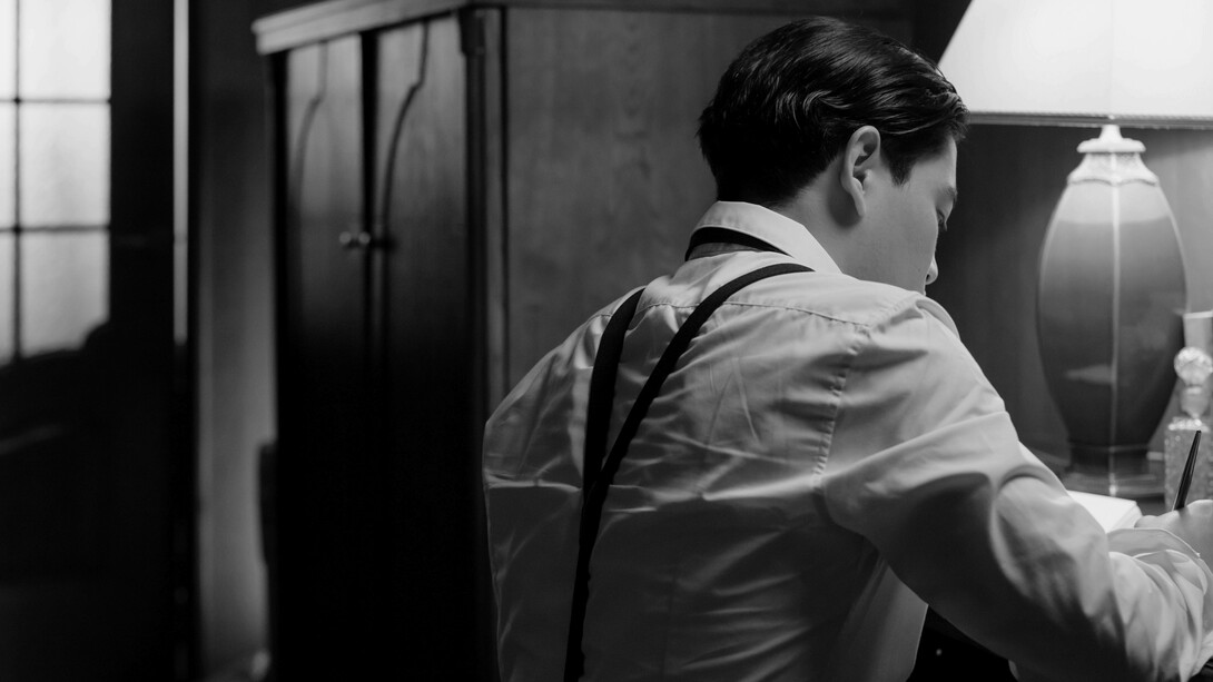 A young Franco Di Tizio at his desk composing one his literary masterpieces