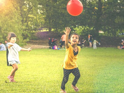 Children playing with a balloon