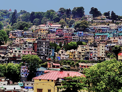 Perched at roughly 2,000 metres above sea level, Nainital is a Himalayan resort town in the Kumaon region of Uttarakhand, India. Formerly a British hill station, the town unfolds around the tranquil Nainital Lak