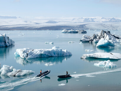 Two boats on the water of the glaciers in Jökulsárlón, Iceland