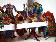 Last Supper (after Leonardo), 13 life-size fibreglass mannequins including a hybrid figure with fur legs and hooves, Dutch wax printed cotton textile, reproduction wooden table and chairs, silver cutlery and vases, antique and reproduction glassware and tableware, fibreglass and resin, 158 x 742 x 260cm, (62 1/4 x 292 1/8 x 102 1/2in)