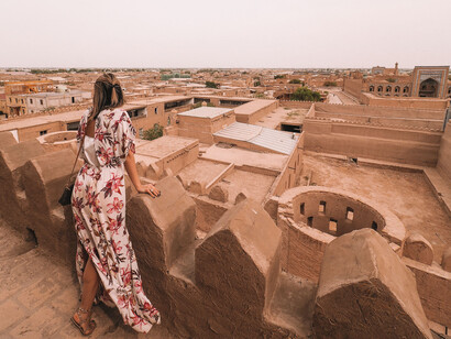 A woman, over looking at the panorama in Khiva, Uzbekistan