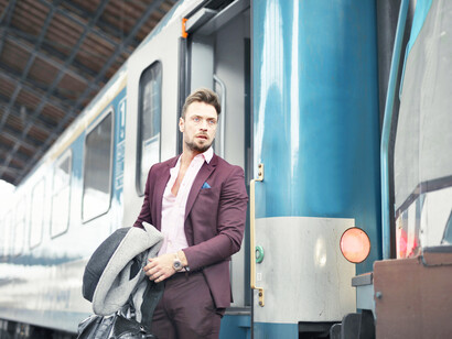 A businessman looking around after exiting the subway