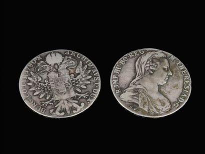 Maria Theresa thalers, back and front. Photograph Robert K. Liu