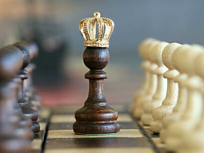 The queen wins the game of chess. It takes time to win, sometimes you make the same mistake over and over again, before learning the lesson life is teaching you