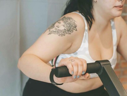 A woman exercising hard to lose weight and become healthier