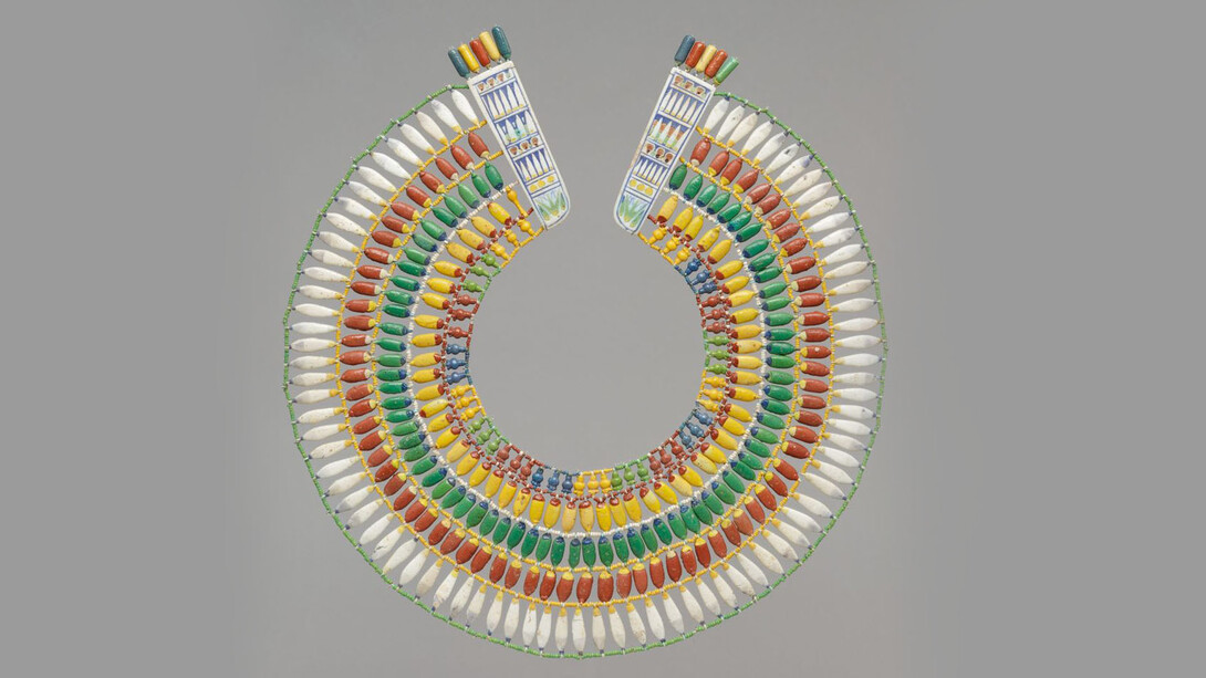 Period:New Kingdom, Amarna Period
Dynasty:Dynasty 18
Reign:reign of Akhenaten
Date:ca. 1353–1336 B.C.
Geography:From Egypt
Medium:Faience
Dimensions:Diam. 31.5 cm (12 3/8 in); Terminals: L. 8.7 cm (3 7/16 in.); W. 2.5 cm (1 in.); Th. 0.6 cm (1/4 in.)
Credit Line:Rogers Fund, 1940