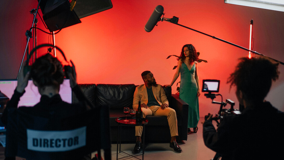 A film crew sets up for a scene, highlighting the behind-the-scenes effort required to bring a compelling story to life in a struggling film industry