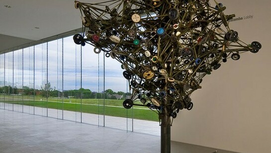 Nari Ward, Land, 2002-present, Metal, wood, parachute materials, barrier cloth, used wheels, and audio elements, 197 x 39-3/8 x 157-1/2 inches, Installation view: Nerman Museum of Contemporary Art, Overland Park, Kansas, Image courtesy the artist and Lehmann Maupin, New York, and Hong Kong