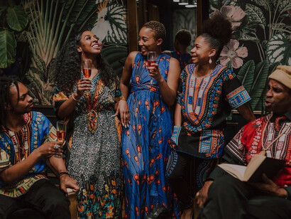 A photograph of a family dressed in their traditional attire
