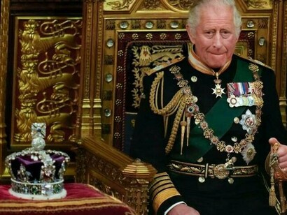Prince Charles is seated next to the Queen's crown during the State Opening of Parliament, at the Palace of Westminster in London, May 10, 2022.
