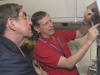 The President of Costa Rica, Oscar Arias Sanchez, on the left, toured the NASA DC-8 on July 27 during the NASA Tropical Composition Cloud and Climate Coupling (TC4) campaign. Dr. Ed Browell, senior research scientist at NASA Langley, at right