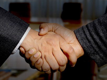 Lobbying, defined shortly as influencing decision makers