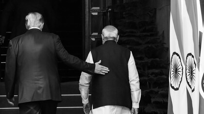 President Donald J. Trump and Indian Prime Minister Narendra Modi walk through the entrance of Hyderabad House in New Delhi on February 25, 2020, before a bilateral program