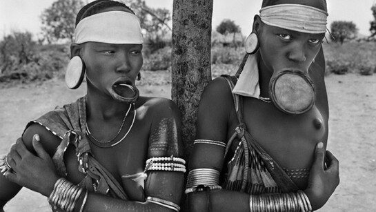 Sebastião Salgado, Mursi village of Dargui in Mago National Park, near Jinka, Ethiopia (two women with lip plates), 2007, Gelatin silver print, 50 x 60 cm/20 x 24 inches © Sebastião Salgado/Amazonas Images
